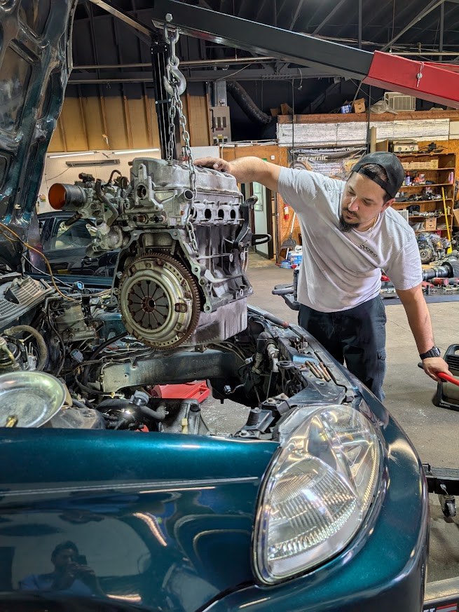 Jeff guiding an engine installation at The Engine Block in Danville, VA